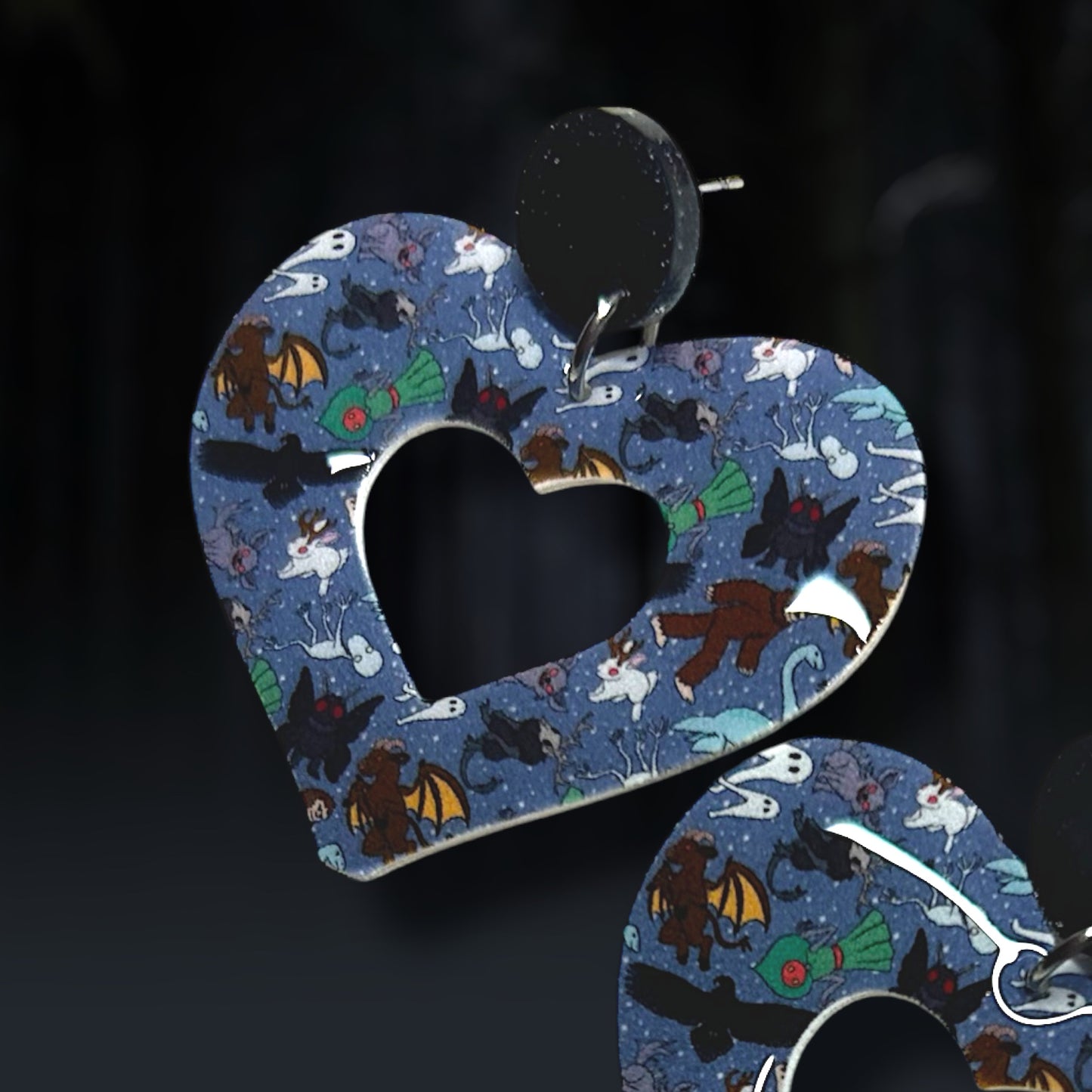 Cryptid Mothman Bigfoot Loch Ness Monster Fresno Nightcrawler Chupacabra Flatwoods Monster Jackalope mod hearts resin statement earrings closeup