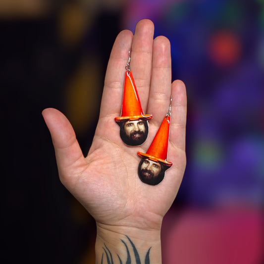 What We Do in the Shadows wizard Nandor traffic cone Nandor the Relentless resin statement earrings being held