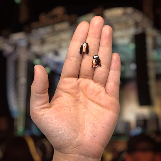 Dying Fetus John Gallagher Sean Beasley face resin stud earrings being held