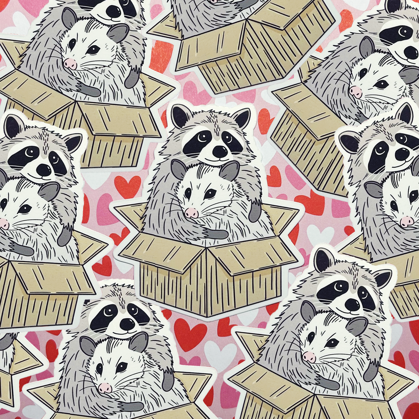Raccoon and possum hugging in box vinyl sticker