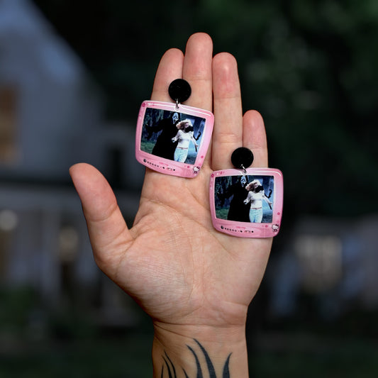 Scream Ghostface Casey Becker chase Hello Kitty TV resin statement earrings being held