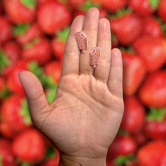 Strawberry shortcake bar Popsicle resin stud earrings being held