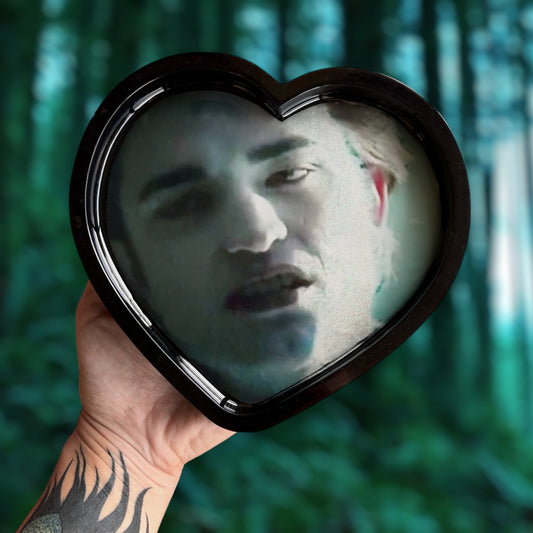 Twilight-inspired sparkly Edward Cullen TITSOAK resin trinket dish being held