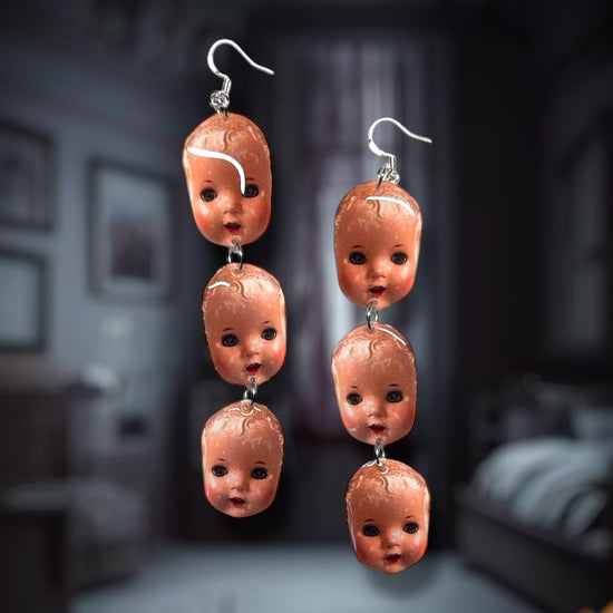 Creepy baby doll head stacked resin statement earrings