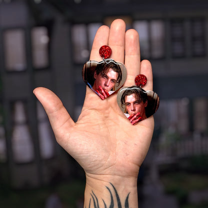 Scream-inspired Billy Loomis corn syrup heart-shaped resin statement earrings being held
