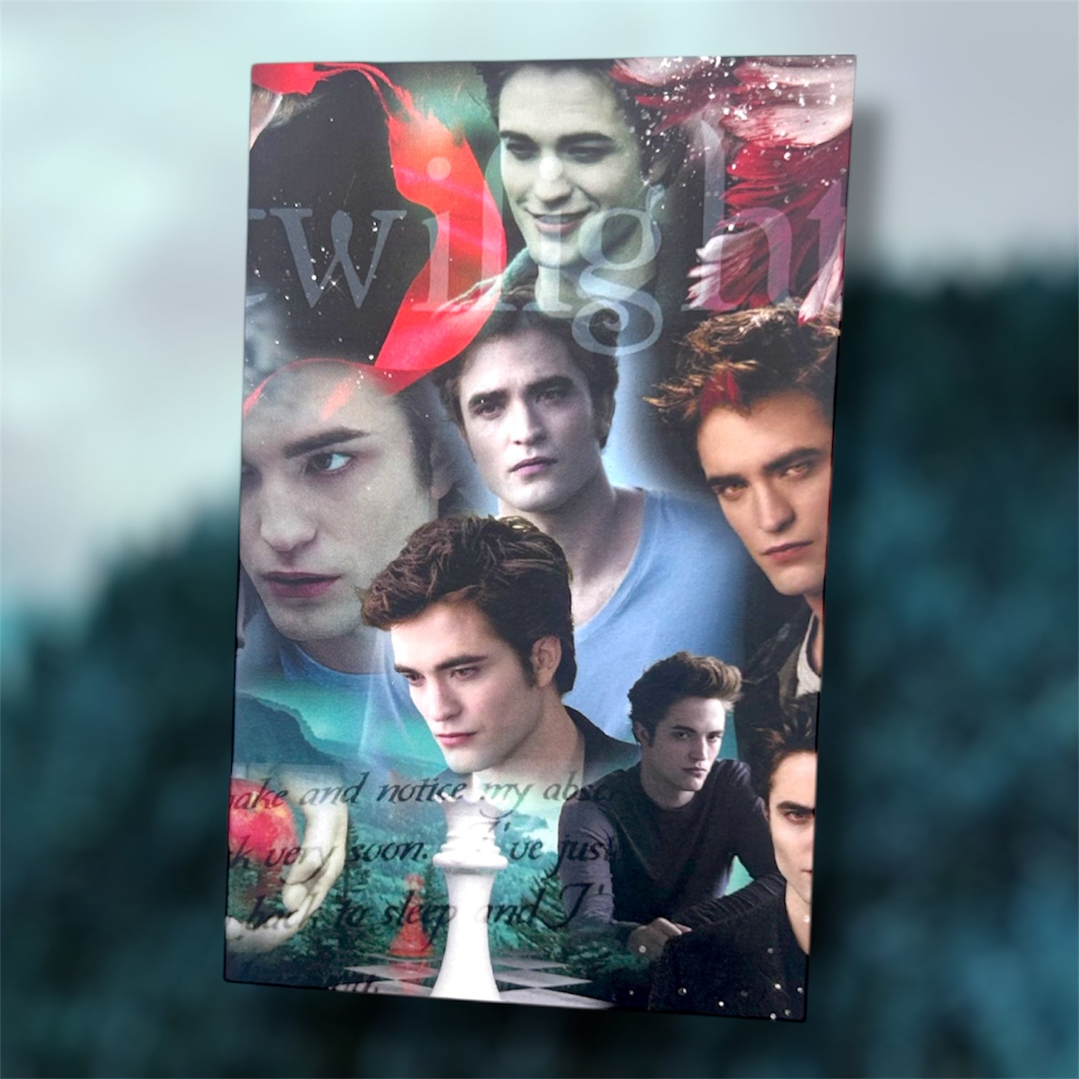 The front cover of a pocket notebook of a Twilight Edward Cullen sparkly vampire TITSOAK collage on a blurred blue background 