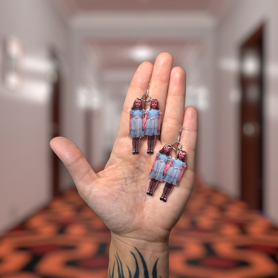 The Shining-inspired Grady twins resin statement earrings