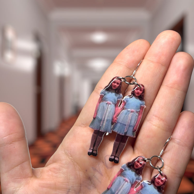 The Shining-inspired Grady twins resin statement earrings closeup