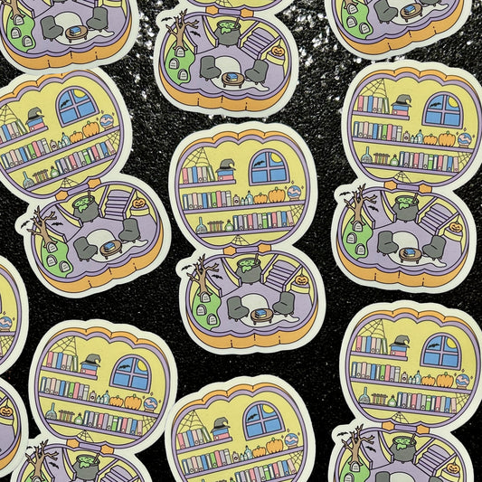 Stickers of Halloween pocket worlds with haunted library, cemetery with graves, bats, and pumpkins on a black background