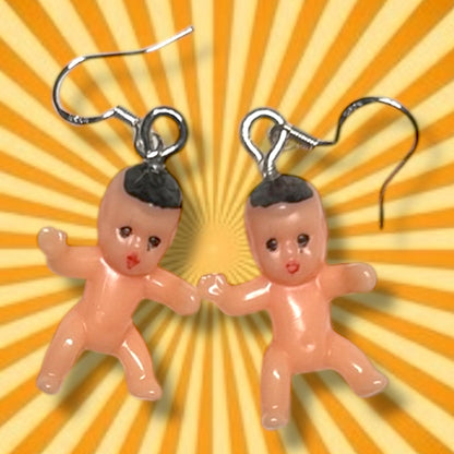 Little plastic babies statement dangle earrings