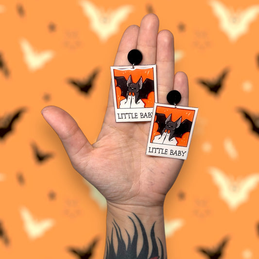 Little baby bat polaroid photo resin statement earrings being held