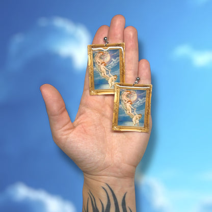 Evelyn De Morgan Moonbeams Dipping Into the Sea painting framed art resin statement earrings being held