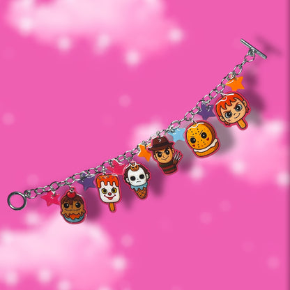 Bracelet with horror movie characters as sweet treats including ice cream cones, popsicles, and cookies and stars on a pink background.