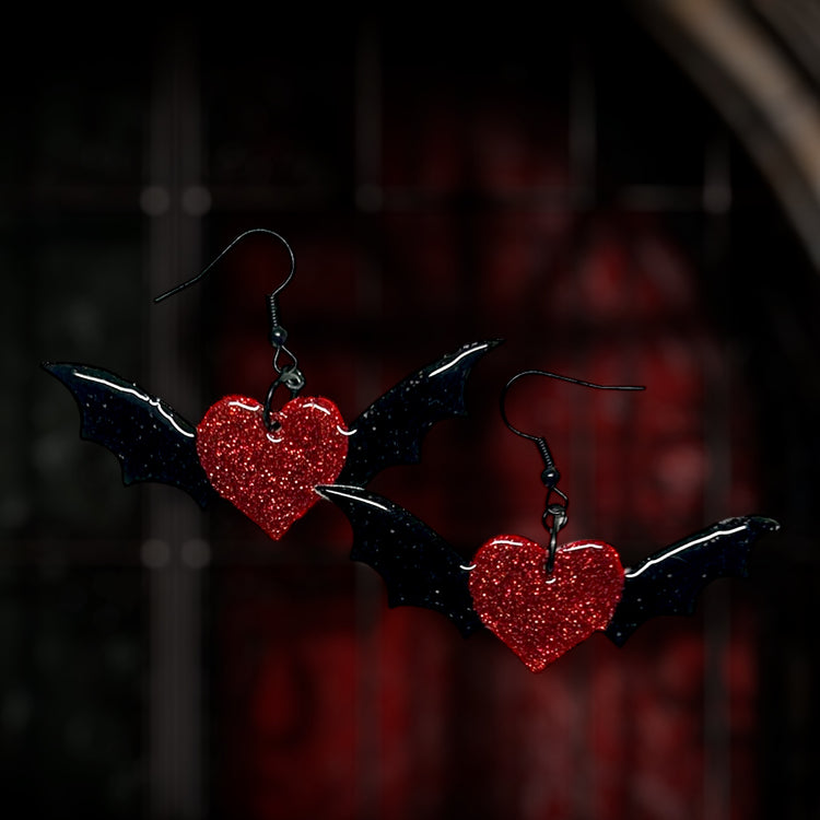 Glittery red and black bat wing heart goth Valentine's Day Valloween resin statement earrings