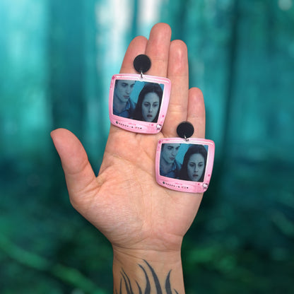 Twilight Edward Cullen Bella Swan forest scene sparkly vampire resin statement earrings being held