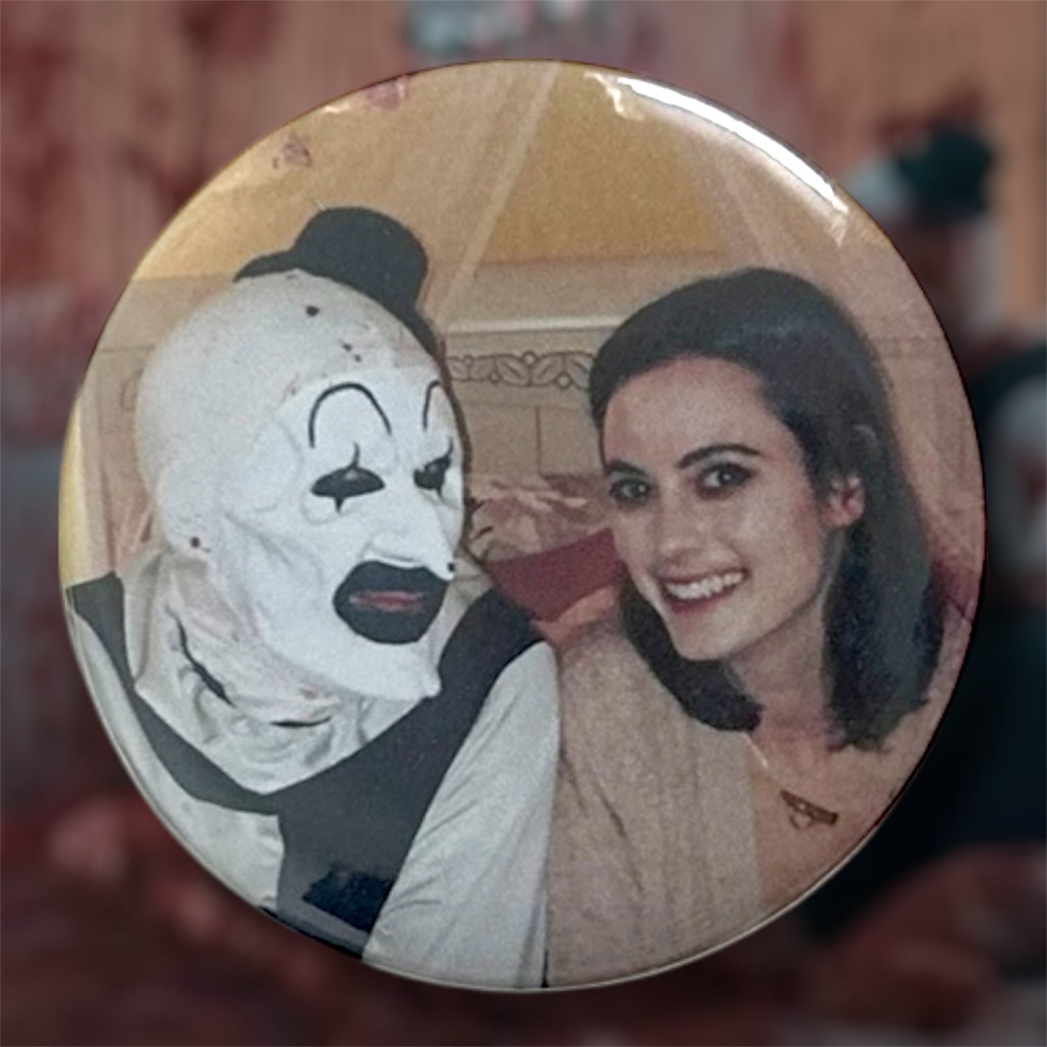 Terrifier bedroom scene smiling Art the Clown black and white mime and Allie behind the scenes pinback button