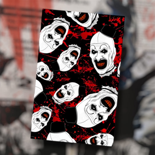 Terrifier Art the Clown mask blood splattered pocket notebook on a blurry background
