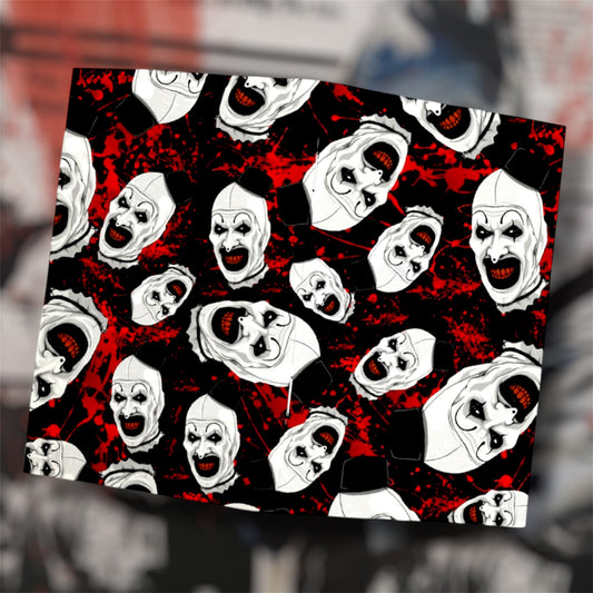 Open Terrifier Art the Clown mask blood splattered pocket notebook on a blurry background