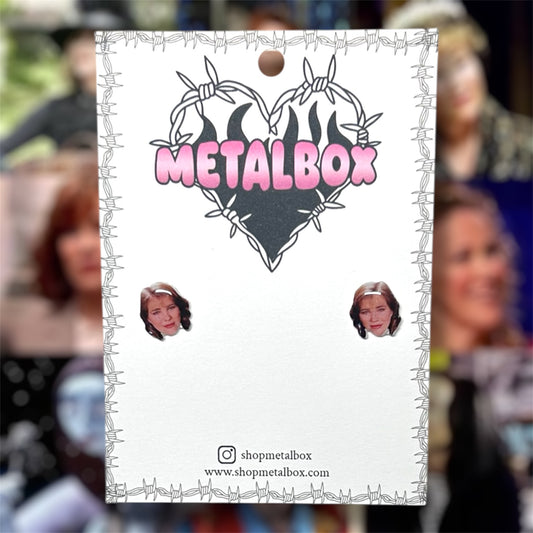 Catherine O'Hara face stud earrings on a Metalbox earring card