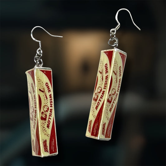Obsession One Wish Willow horror movie curse dangle earrings on a blurry background Nikki Freeman Bear