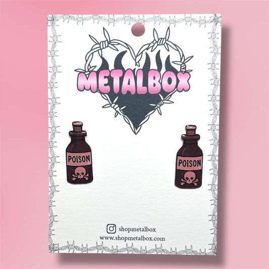 Skull and crossbones poison bottle resin stud earrings