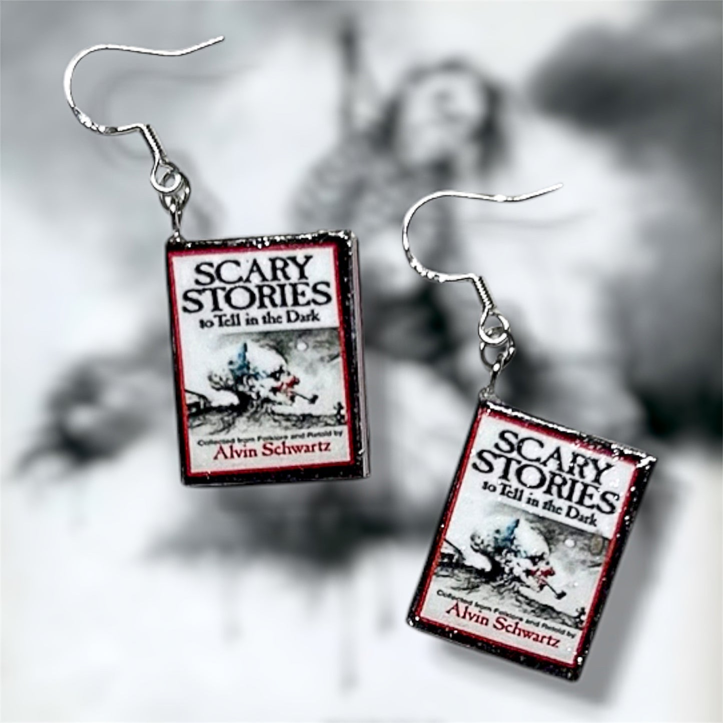Scary Stories to Tell in the Dark nostalgic horror poetry miniature book earrings on a blurry black and white background