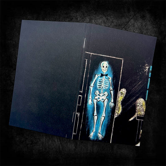 Open glowing blue skeleton wearing a bowtie and sheet ghosts spooky cute notebook